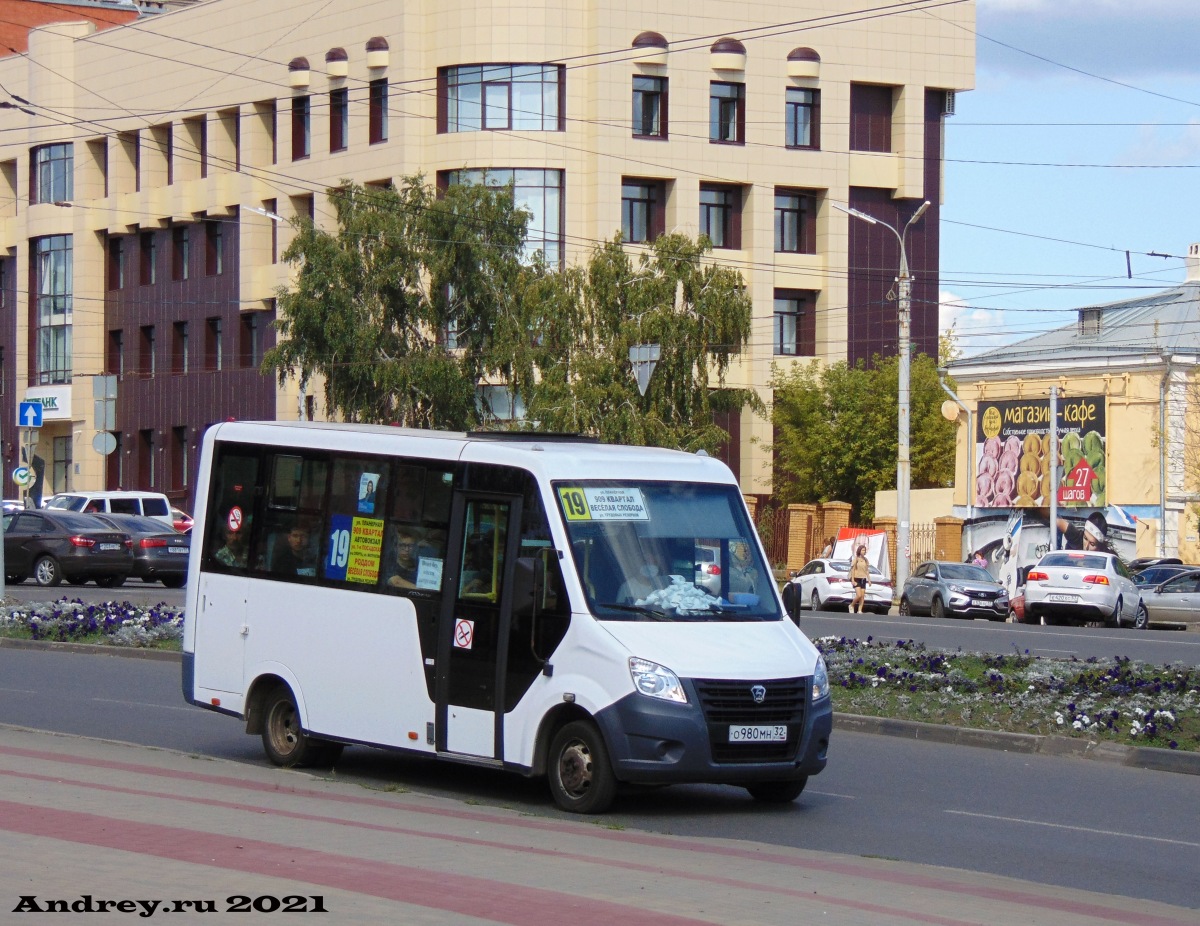 О 980 МН 32
