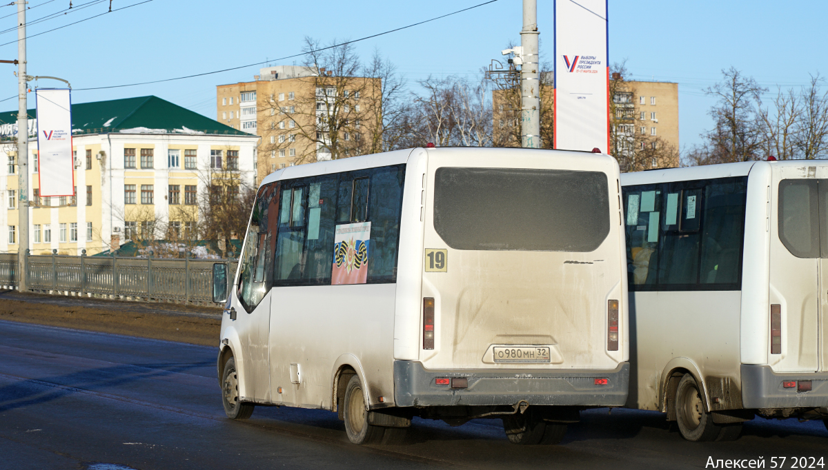 О 980 МН 32